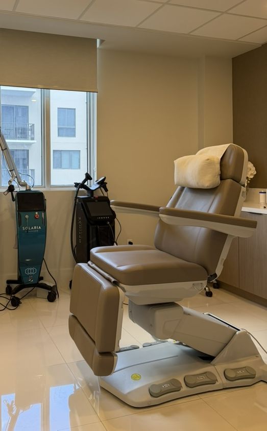 The Glow Suite device room, Suite 601, with a Solaria, an Optimas and a treatment chair